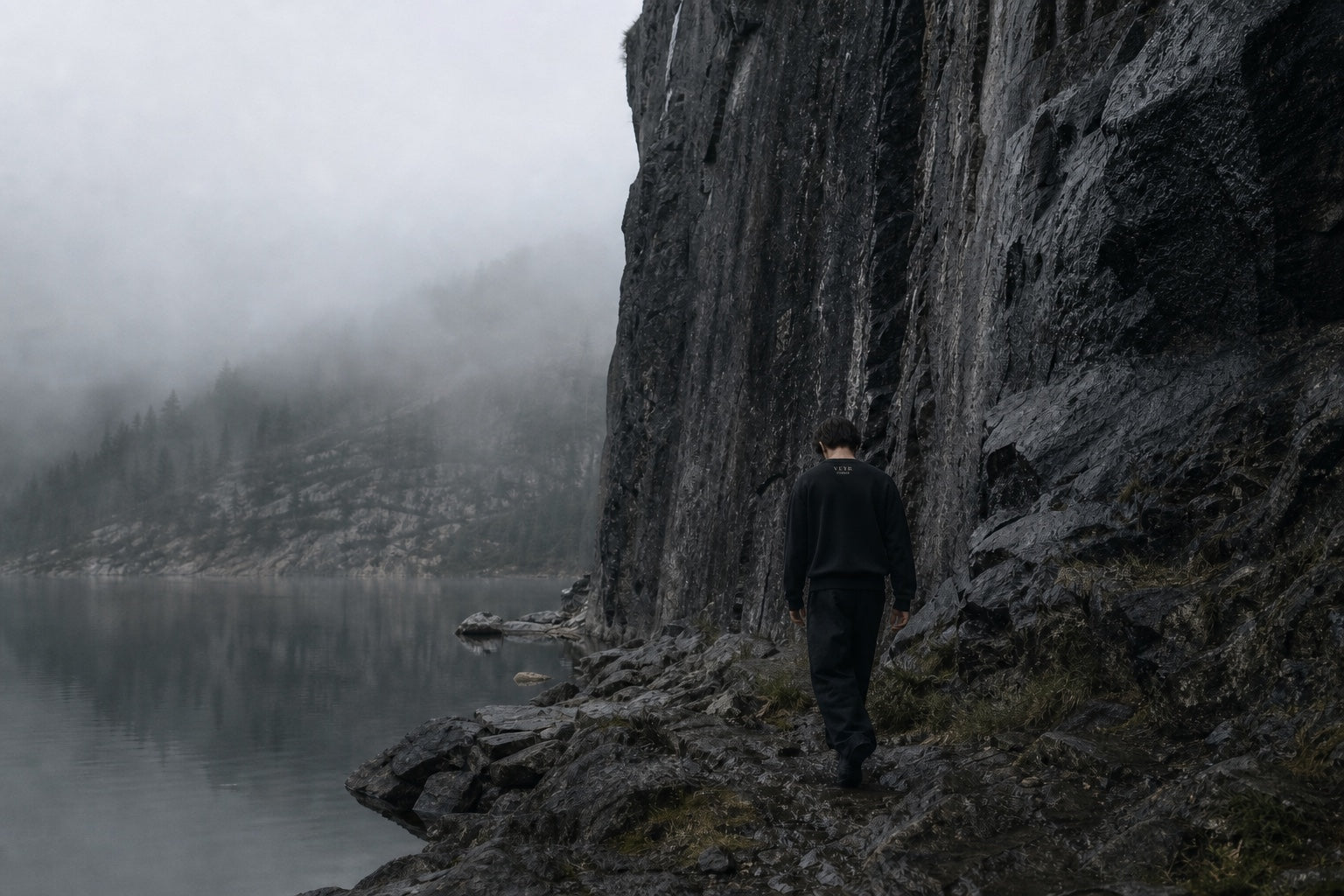 VEYR Presence Crew beside a misted mountain lake